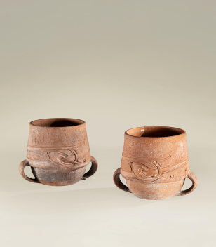 Pair of Arts & Crafts Liberty & Co 'Thrym' Terracotta pots Pair of Arts & Crafts Liberty & Co 'Thrym' Terracotta pots