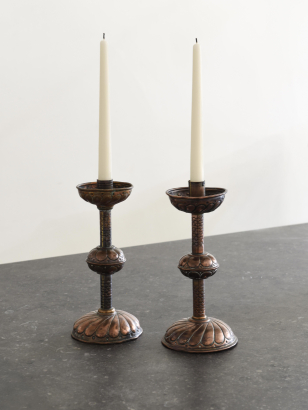 Pair of Arts & Crafts Copper Repoussé Candlesticks