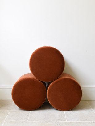 Round Ottoman in Burnt Sienna